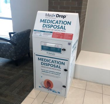 The white MedDrop medication disposal kiosk sits near the main entrance at Tidelands Georgetown Memorial Hospital.