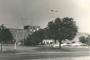 A sepia toned image of Georgetown Memorial Hospital during the 1970s.